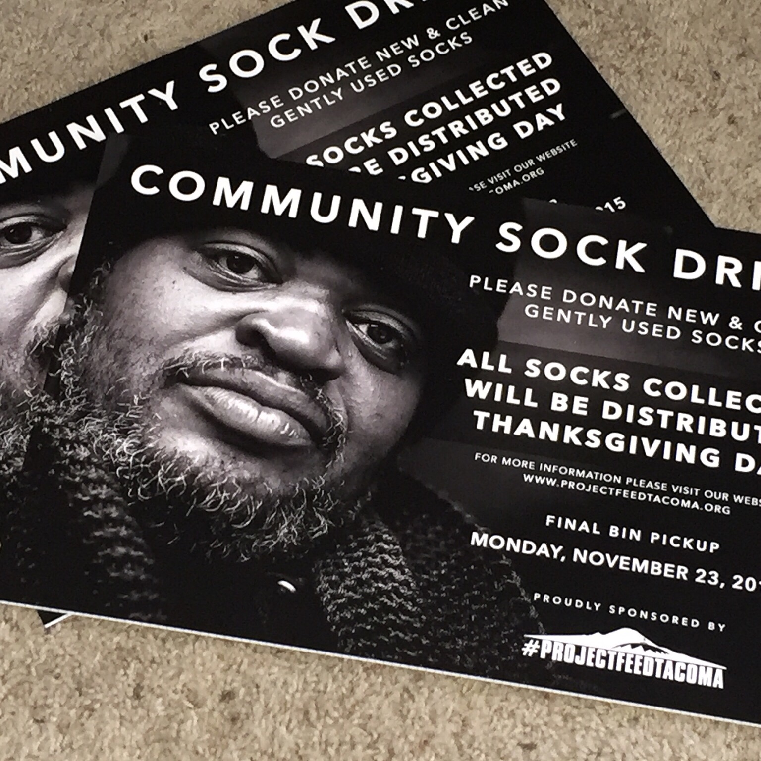 Printed marketing flyers for a community sock drive